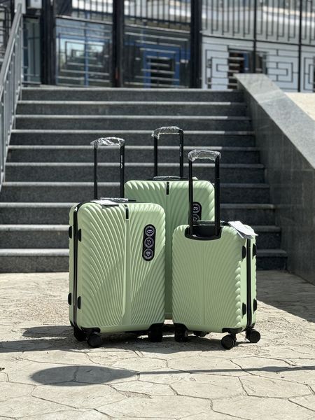Wings Ударостійка пластикова Валіза Велика ( L ), на 4 колесах Wings 120 (green) L Зеленый Wings 120 (green) L Зеленый Wings 120 (green) L фото