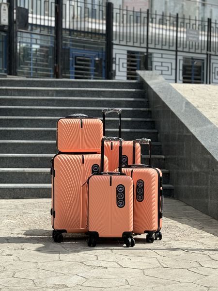 Wings Ударостійка пластикова Валіза Середня (M), на колесах Wings 120 (peach) M Помаранчевий Wings 120 (peach) M фото