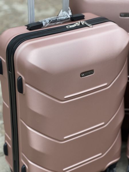 Wings Ударостійка пластикова Валіза Велика (L), на 4 колесах Unlim 147 (pink gold) L Рожевий Unlim 147 (pink gold) L фото