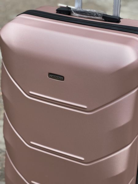 Wings Ударостійка пластикова Валіза Велика (L), на 4 колесах Unlim 147 (pink gold) L Рожевий Unlim 147 (pink gold) L фото