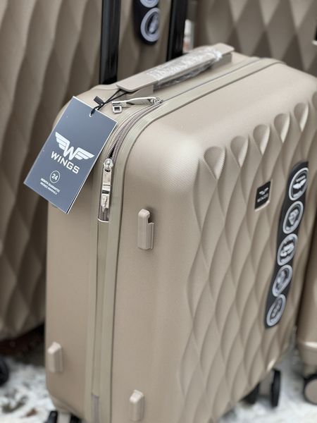 Wings Ударопрочный пластиковый Чемодан Большой (L), на 4 колесах Wings TD190 (champagne) L Бежевый Wings TD190 (champagne) L фото