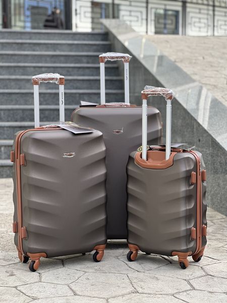 Wings Ударостійка пластикова Валіза Велика (L), на 4 колесах Wings 402 (coffee) L Коричневий Wings 402 (coffee) L фото