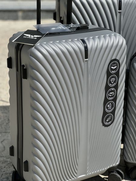Wings Ударопрочный пластиковый Чемодан Большой (L), на 4 колесах Wings 120 (grey) L Серый Wings 120 (grey) L фото