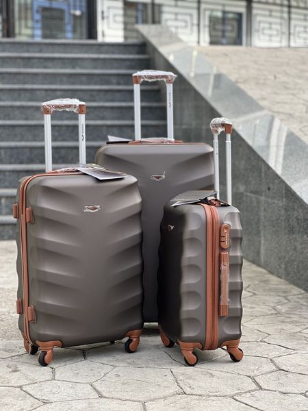 Wings Ударостійка пластикова Валіза Велика (L), на 4 колесах Wings 402 (coffee) L Коричневий Wings 402 (coffee) L фото
