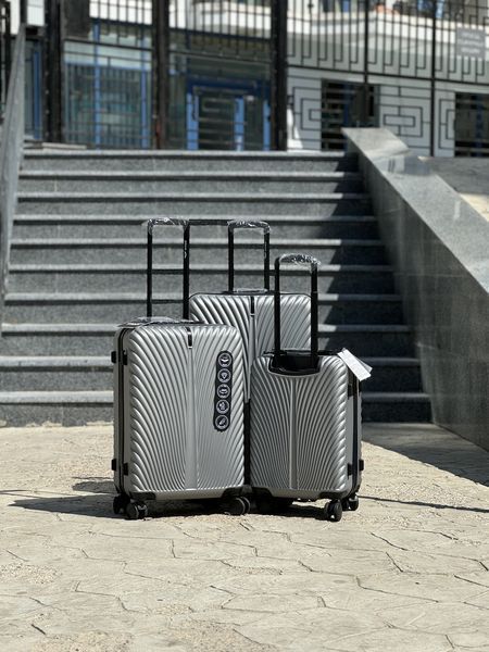 Wings Ударопрочный пластиковый Чемодан Большой (L), на 4 колесах Wings 120 (grey) L Серый Wings 120 (grey) L фото