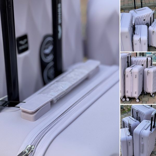 Wings Ударостійка пластикова Валіза Велика (L), на 4 колесах Wings TD190 (lavender) L Лавандовый Wings TD190 (lavender) L фото