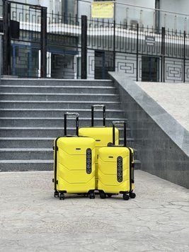 Wings Ударостійка пластикова Валіза Середня ( M ) з розширенням, на колесах Wings 148 Wings 148 (yellow) M фото