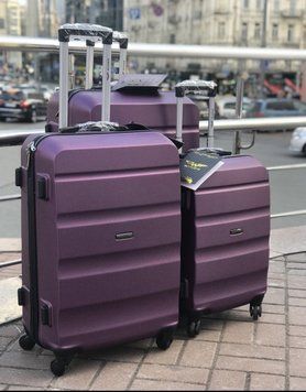 Wings Ударостійка пластикова Валіза Середня ( M ), на колесах Wings AT01 (purple) M Фиолетовий Wings AT01 (purple) M фото