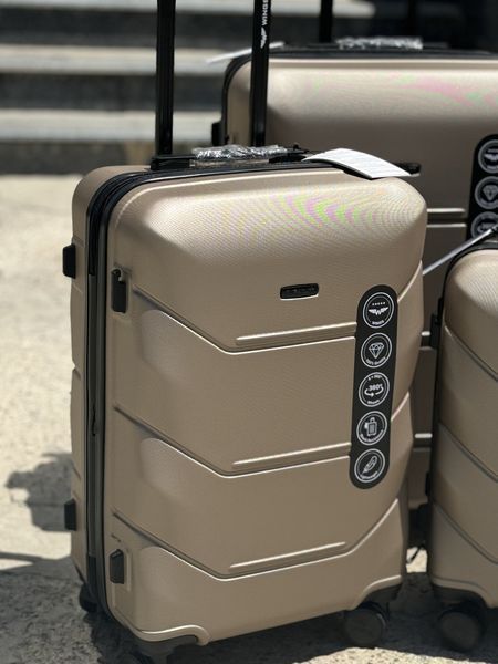 Wings Ударостійка пластикова Валіза Середня ( M ) з розширенням, на колесах Wings 148 Wings 148 (shampoo) M фото