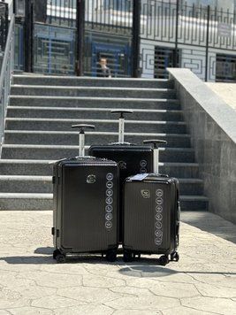 Wings Ударопрочный пластиковый Чемодан Большой (L), на 4 колесах Wings 565 (black) L Черный Wings 565 (black) L фото